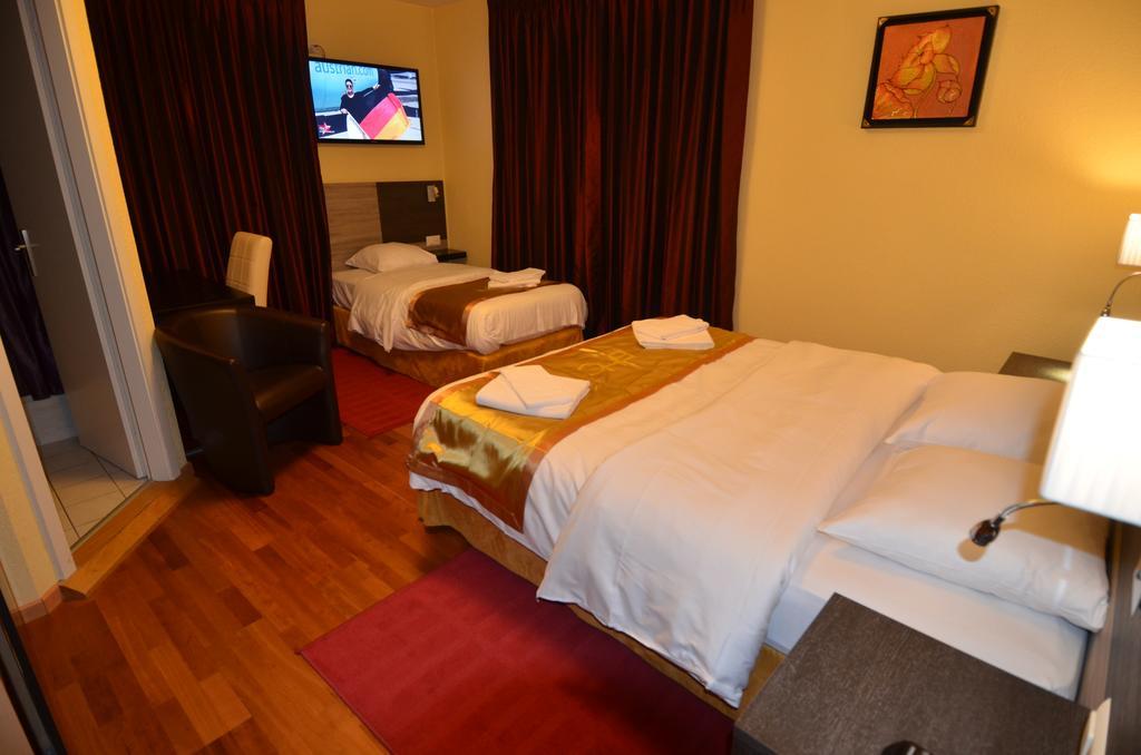 Hotel Beausite Crissier Pokoj fotografie
