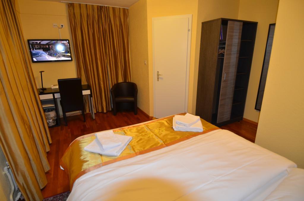 Hotel Beausite Crissier Pokoj fotografie