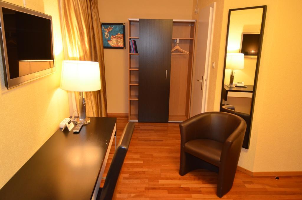 Hotel Beausite Crissier Pokoj fotografie