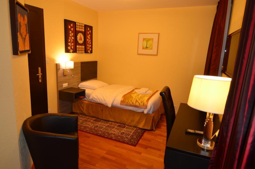 Hotel Beausite Crissier Pokoj fotografie